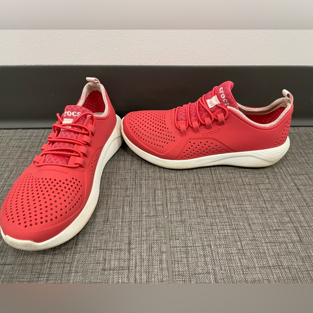 Coral pink Crocs Lite Stride shoes